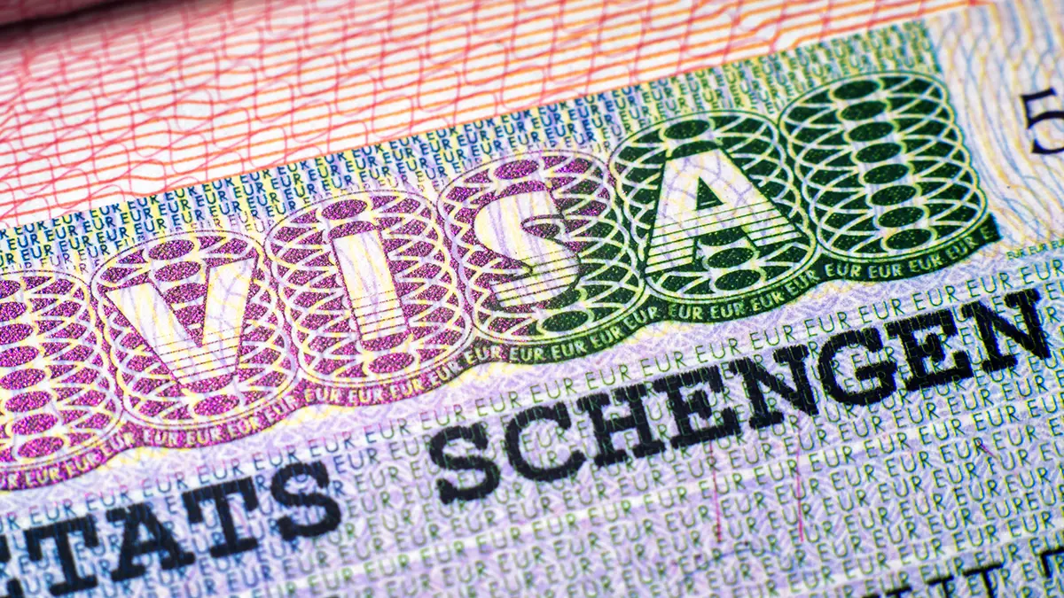 schengen-visa-passport-closeup.webp