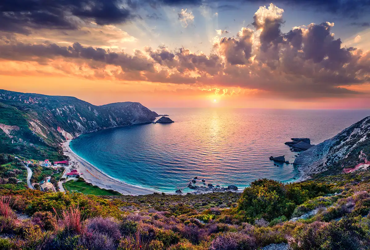 Greek beach during golden hour before the sunset.