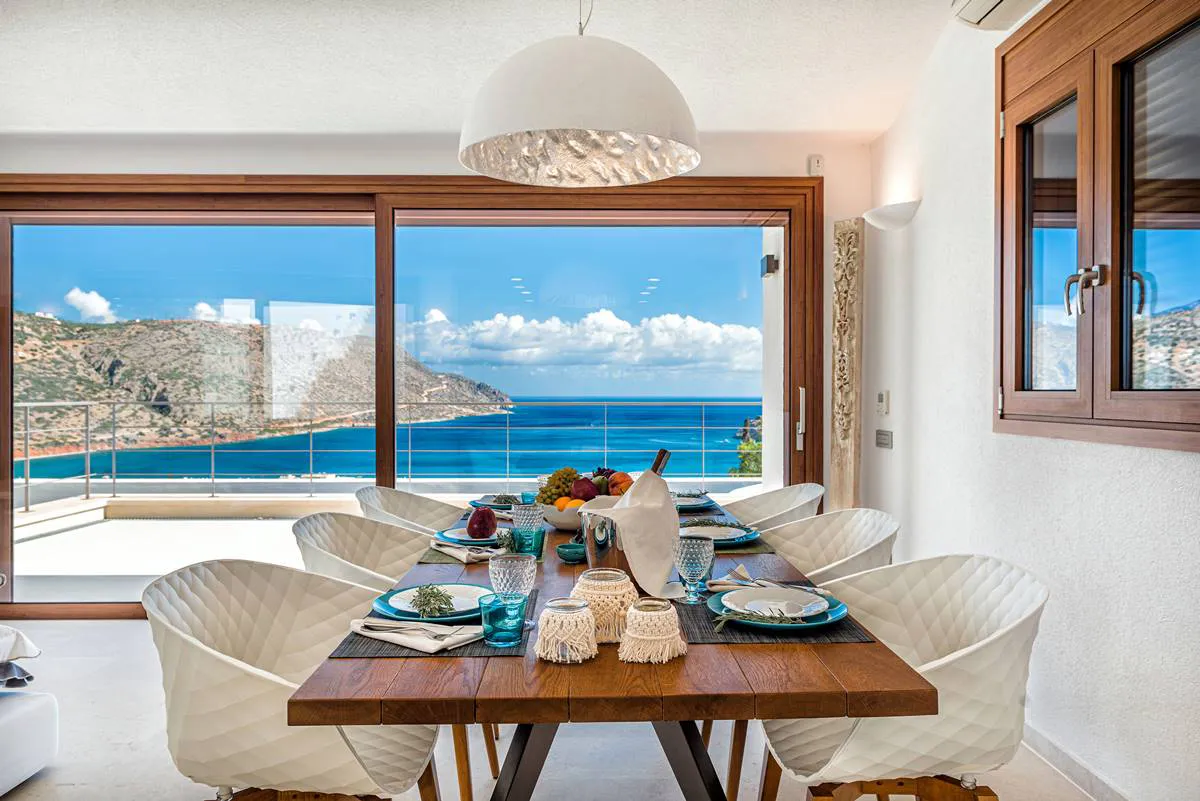 Interior of a luxurious villa in Greece with a view on the sea.